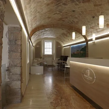 Santa Chiara Гостевой дом Ассизи